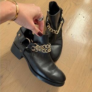 Zara black boots with chains